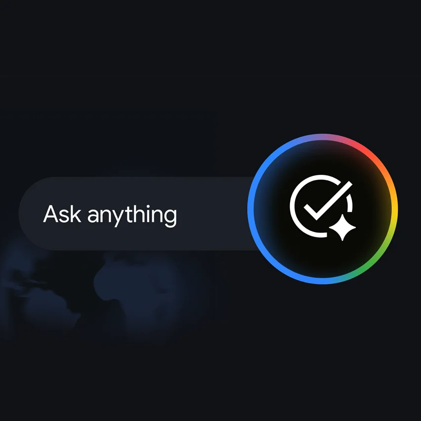 An 'Ask anything' text input field on a dark background with a faint world map, next to a circular button featuring a rainbow border and a white checkmark-and-sparkle icon.