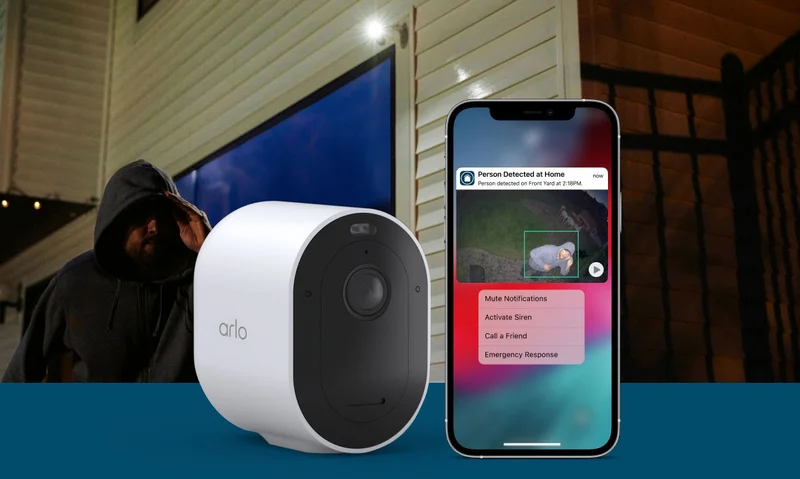 Arlo Pro 5S 2K Wireless Security Camera next to a phone displaying a simulated screen image of an Arlo Secure notification with animated preview.
