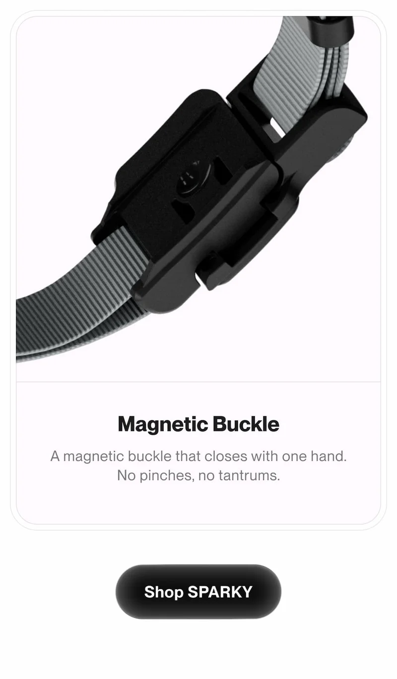 Close-up of the SPARKY magnetic buckle, showing the easy one-hand closure system.
