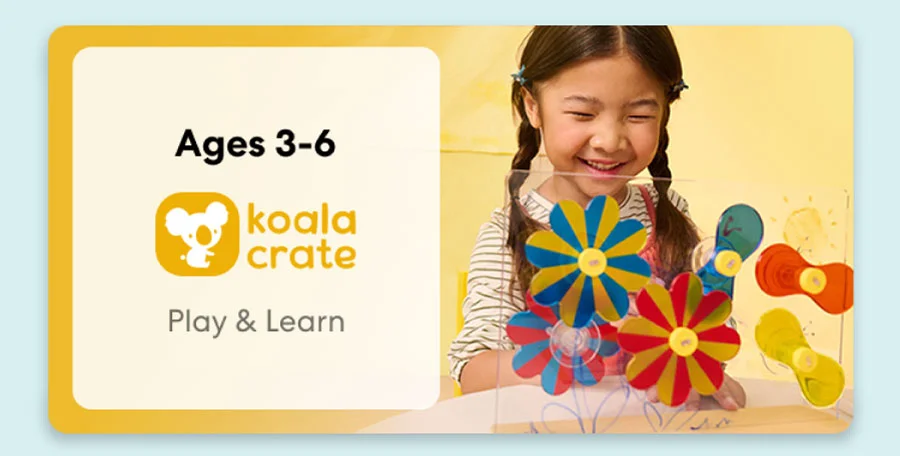 Young child smiling while working on creative KiwiCo Sprout projects, perfect for ages 3–5 for play and learn.