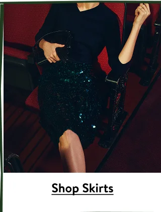 A woman wearing a sequined skirt.