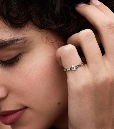 Model with diamond ring