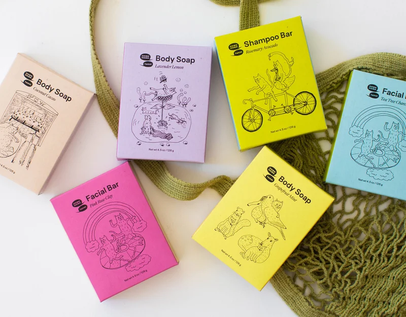 A collection of bar soaps lay on a tabletop