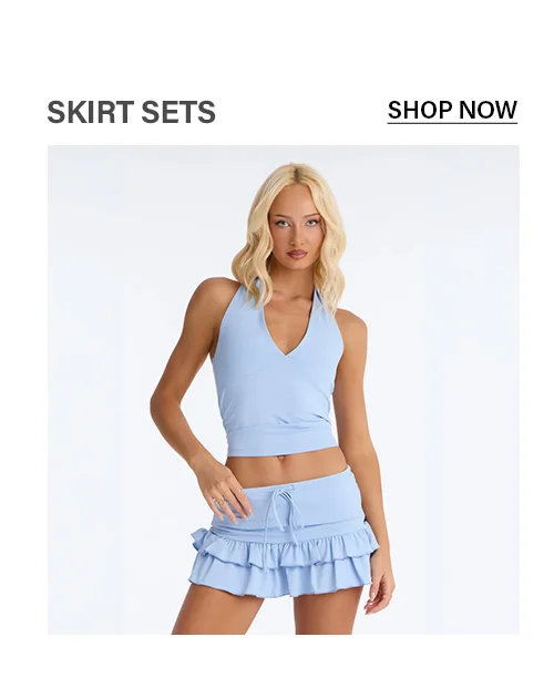 Light blue v-neck halter crop top & ruffled mini skirt set for women.