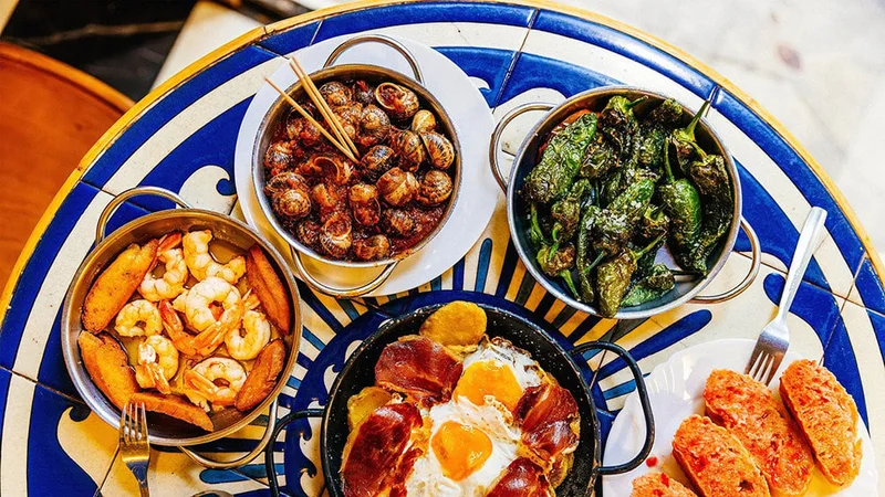 Image description: Overhead shot of tapas at a restaurant in Madrid