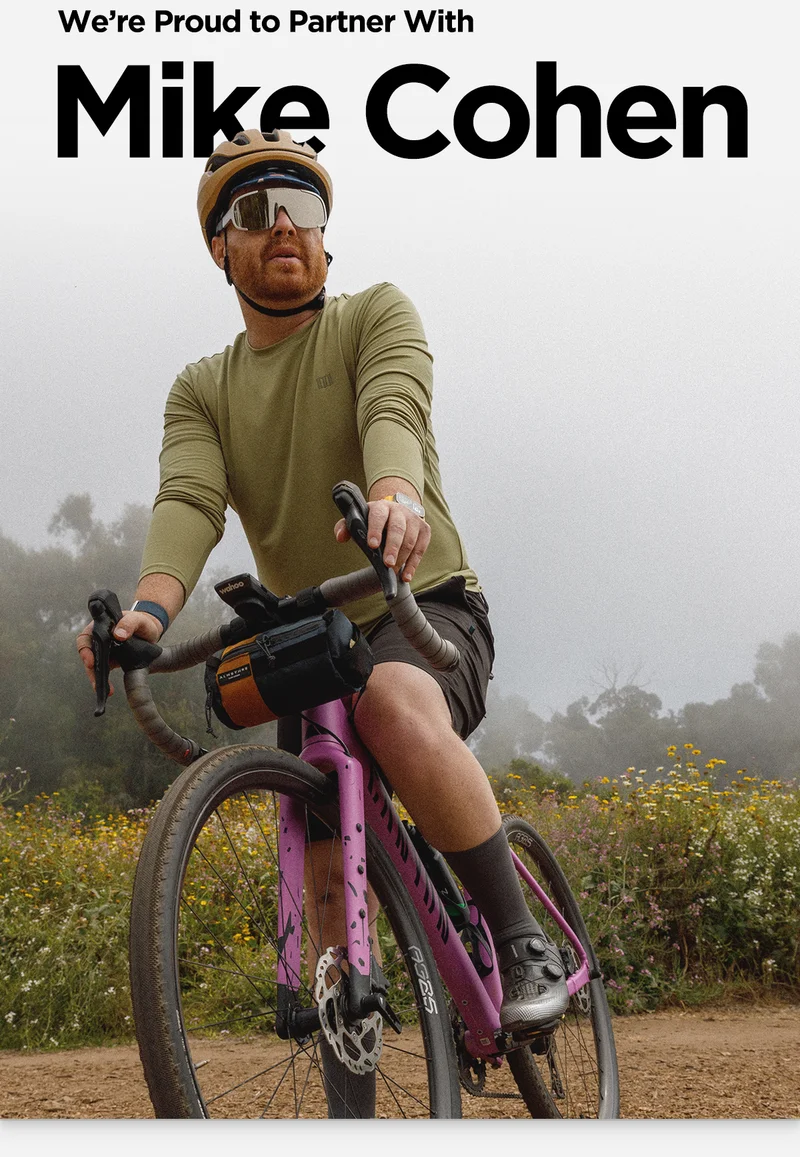 We're proud to partner with Mike Cohen. Mike is on a pink gravel bike with Apple Watch Ultra and Rocky Point Band