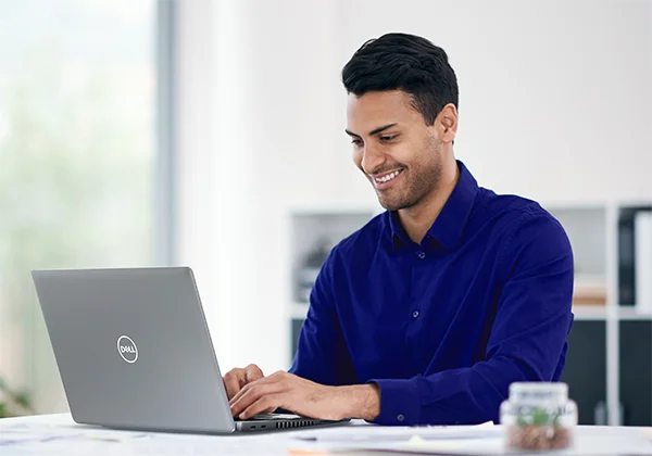 Young Businessman Working in a Modern laptop