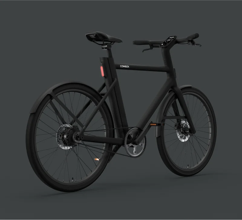 A photographic render of a Cowboy bike viewed from a rear angle.