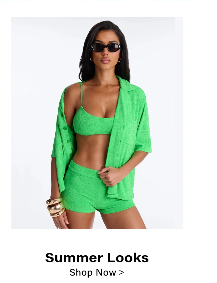 Woman in lime green textured summer outfit: bralette, shorts, open shirt, sunglasses. Shop summer looks.