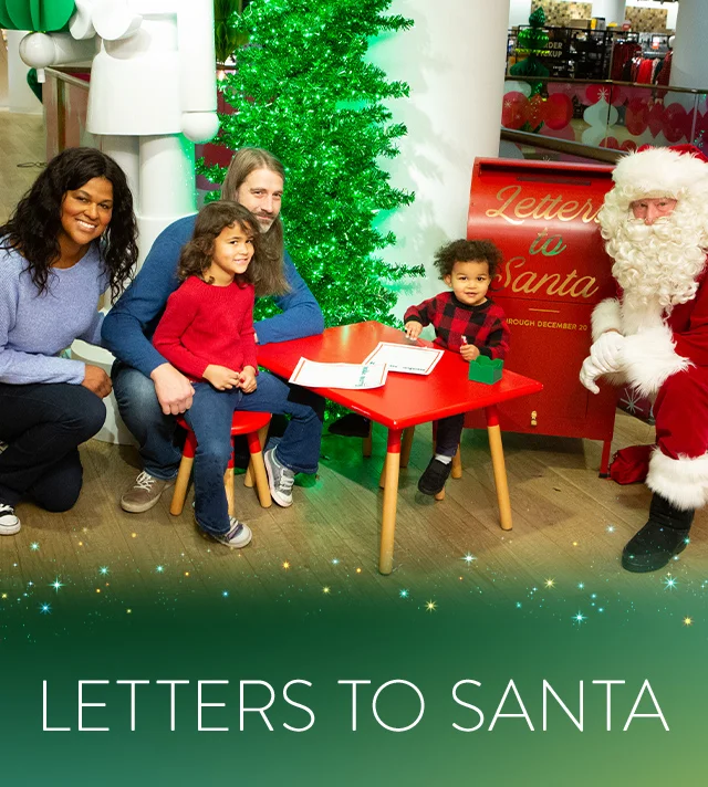 Children writing letters to Santa.