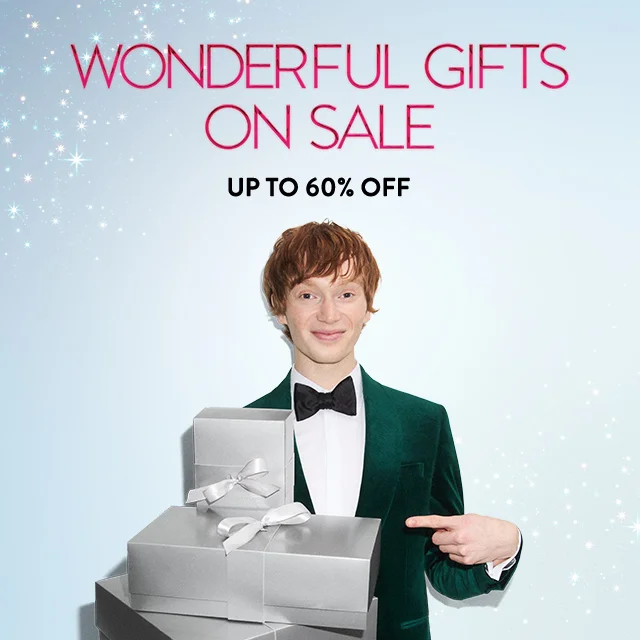 Wonderful gifts on sale up to 60% off. Man holding wrapped presents.