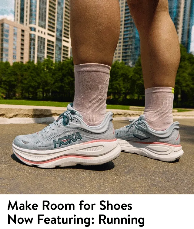 HOKA running shoes. Woman wearing activewear and HOKA running shoes.
