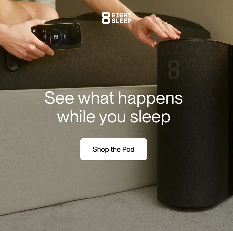 an image of a person is taking a picture of a speaker