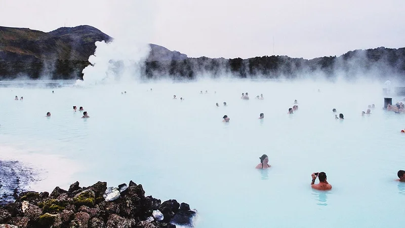 Image description: People soaking in the Blue Lagoon in Iceland