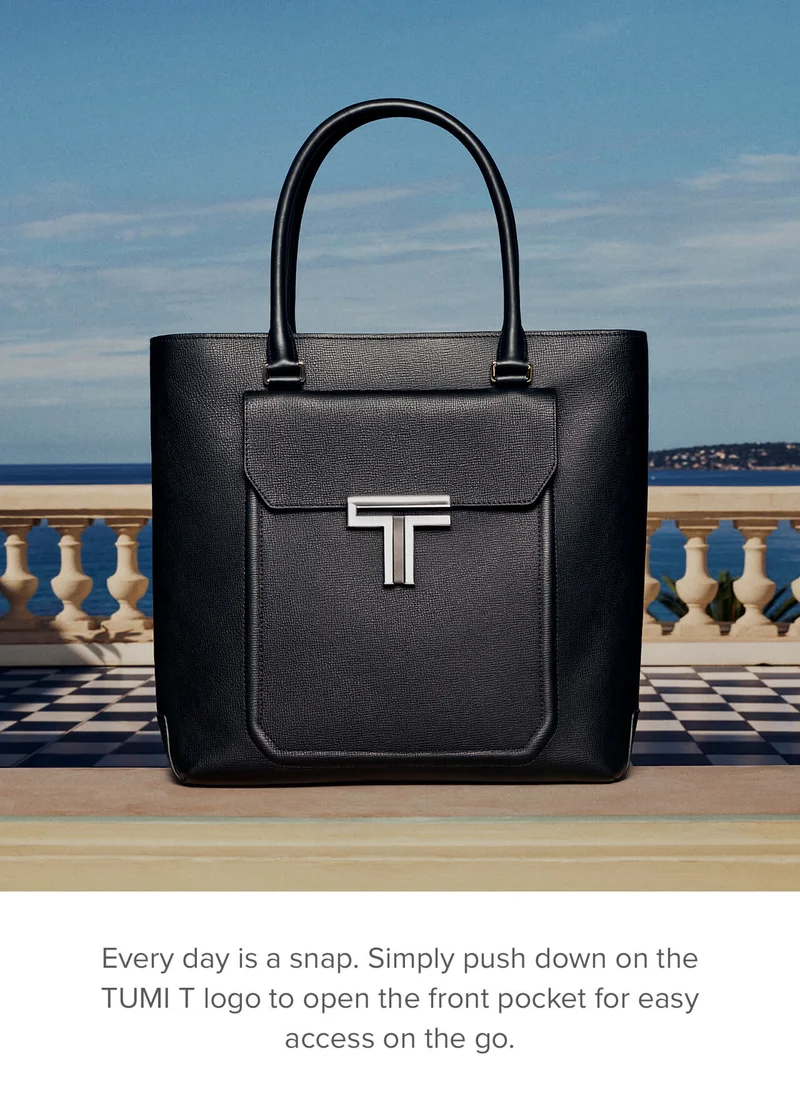 Every day is a snap. Simply push down on the TUMI T logo to open the front pocket for easy access on the go.