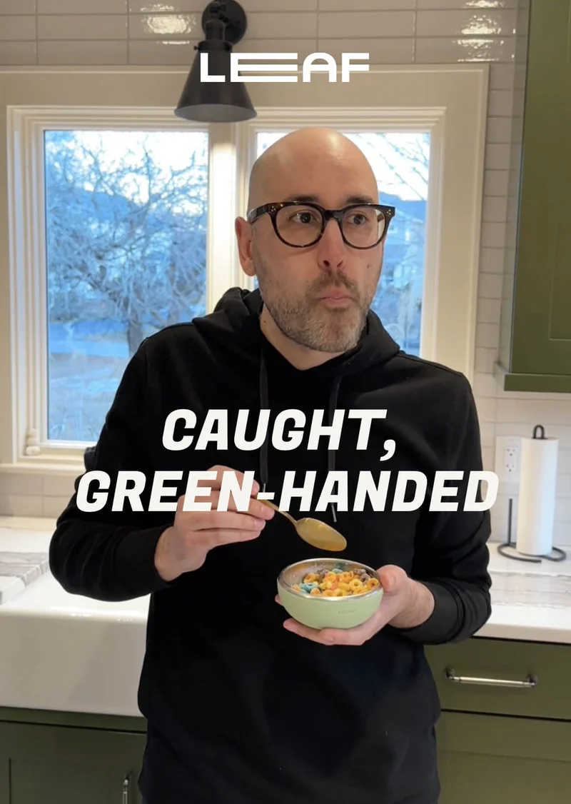 Man eating fruity pebbles out of a shave bowl