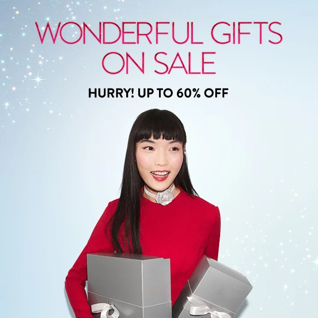 Wonderful gifts on sale up to 60% off. Woman holding wrapped presents.