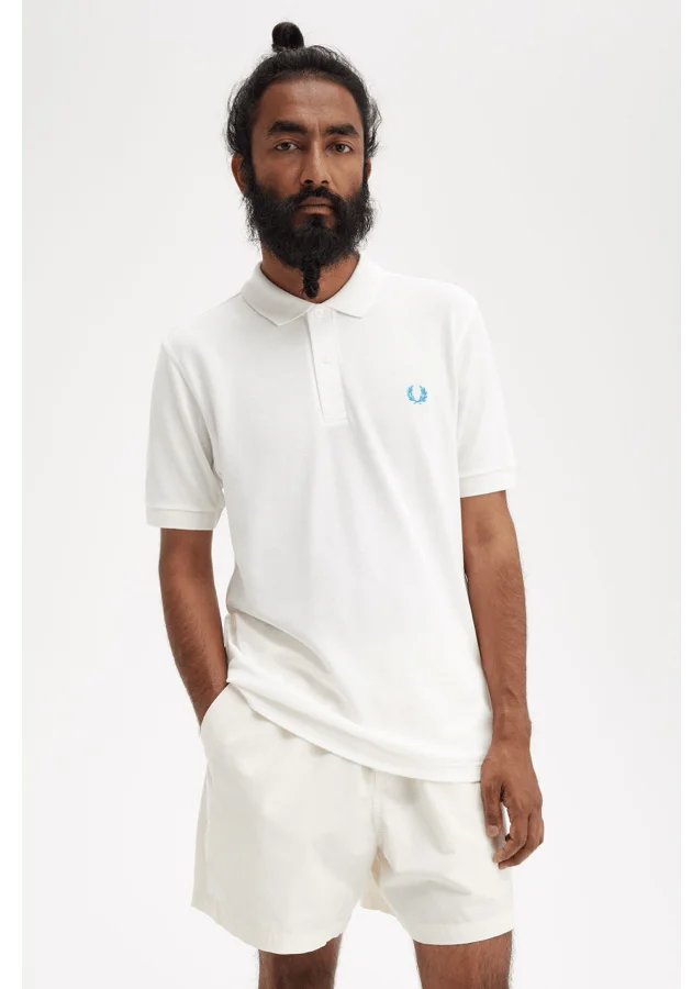 Mens snow white Fred Perry polo shirt with an ocean coloured laurel wreath