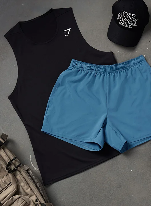 Black tank with Blue sport shorts.