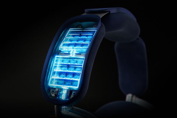 A cutaway into the headband of the Dyson OnTrac headphones shows the lithium-ion batteries highlighted in blue.