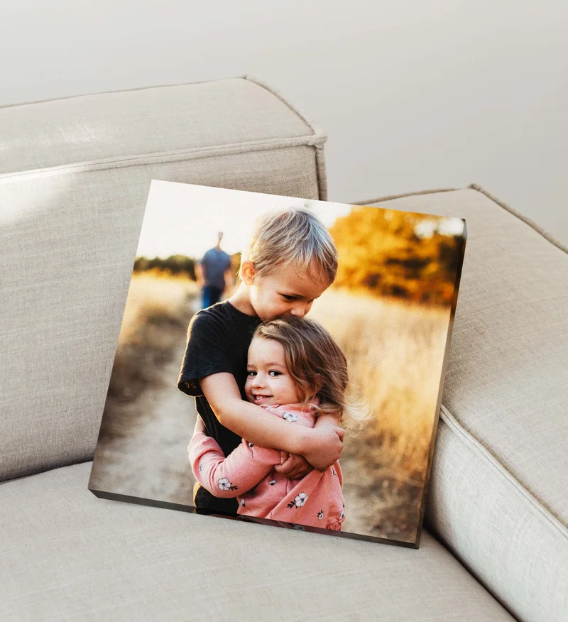 Canvas print of brother and sister hugging.