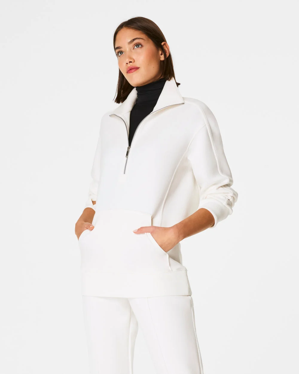 AIRESSENTIALS HALF ZIP TUNIC