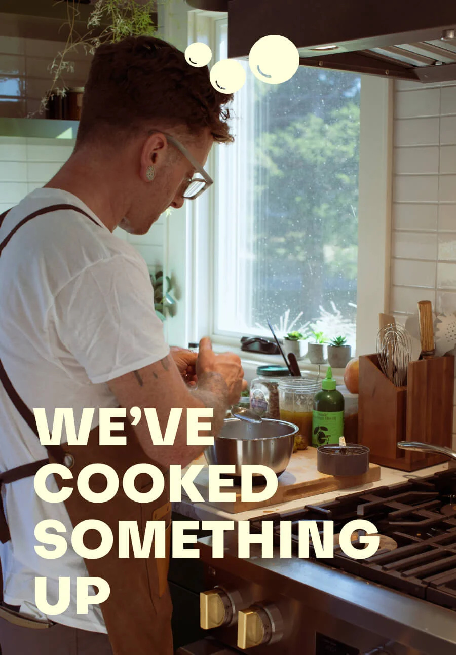 Man in kitche, with words overlayed "We've cooked something up"