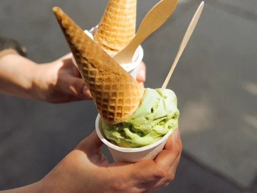 hands holding ice cream