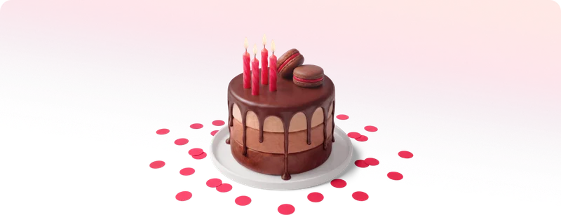 An illustrated chocolate drip cake topped with lit candles and macarons with pink confetti scattered around.