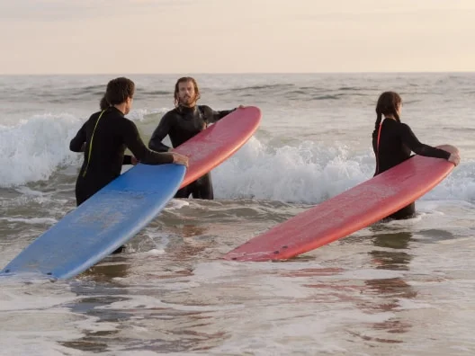 people surfing in the ocean