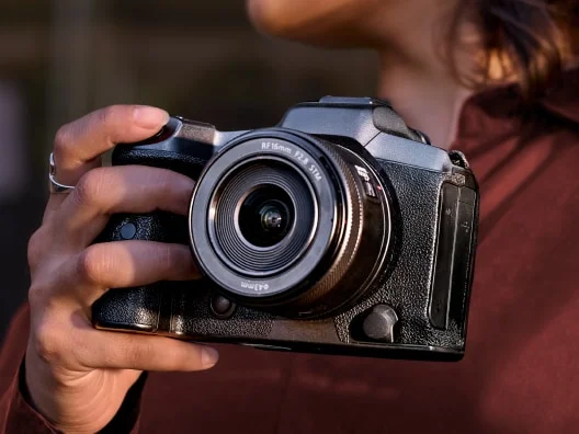 a person holding a camera
