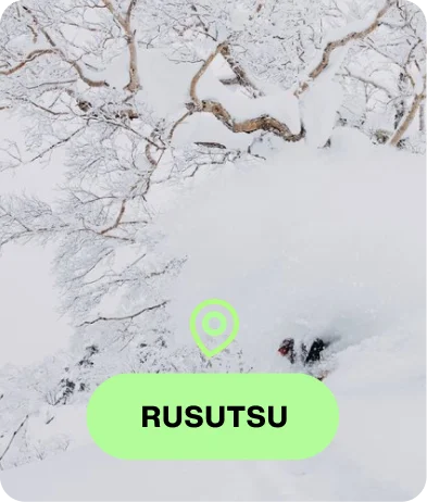 Snowboarder riding a Burton gear with the text Rusutsu