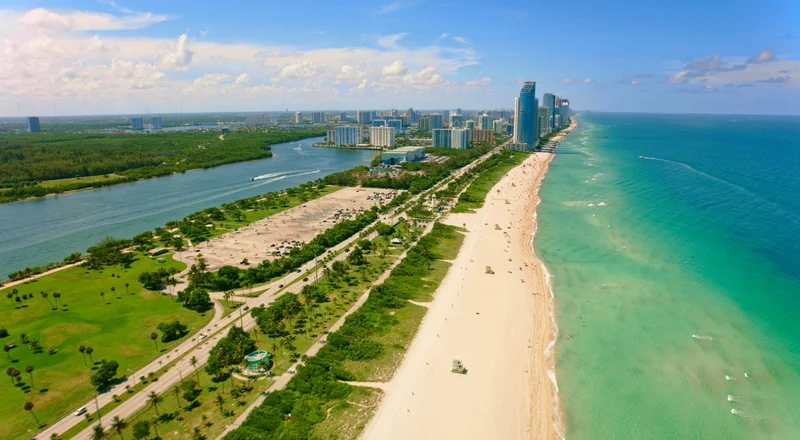 Aerial view of a beach and tall buildings in Miami, Florida