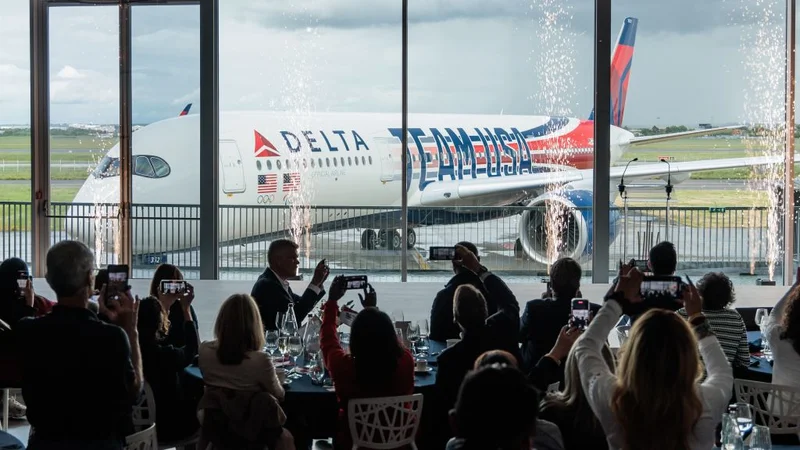 Delta unveiled its custom Airbus A350 Team USA aircraft livery in Toulouse, France honoring the airline's commitment to celebrate the athletes' journey.