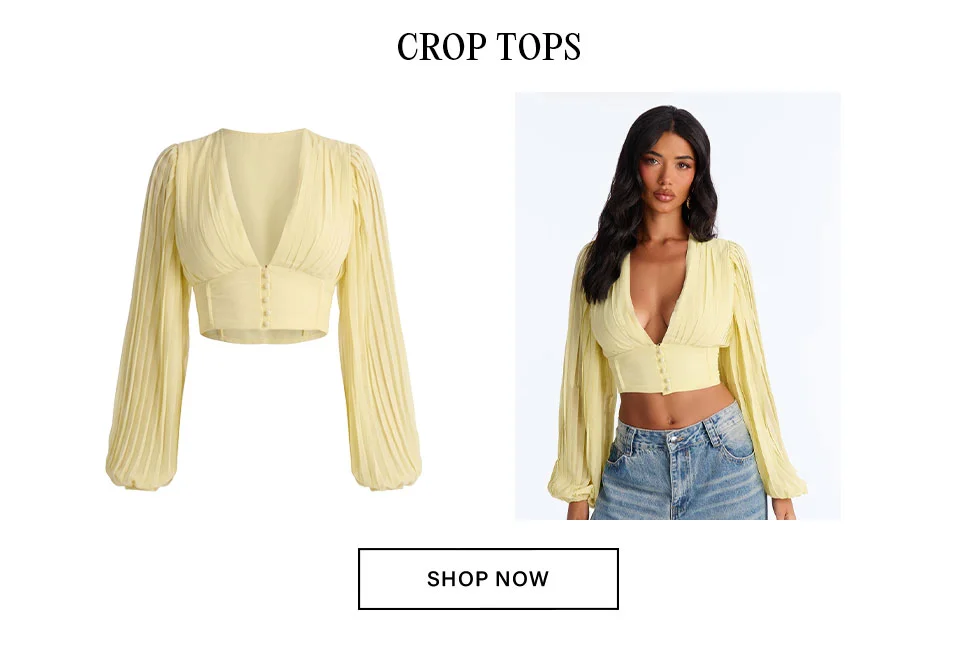 Pale yellow pleated V-neck long-sleeve crop top with front buttons, modeled with jeans. Shop new chic crop top styles today!