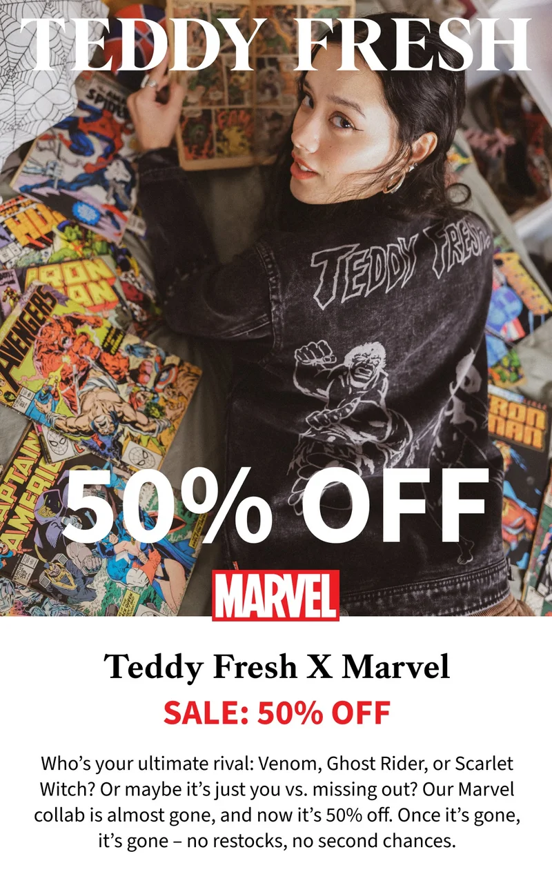 Our model lying in bed with a bunch of marvel comics