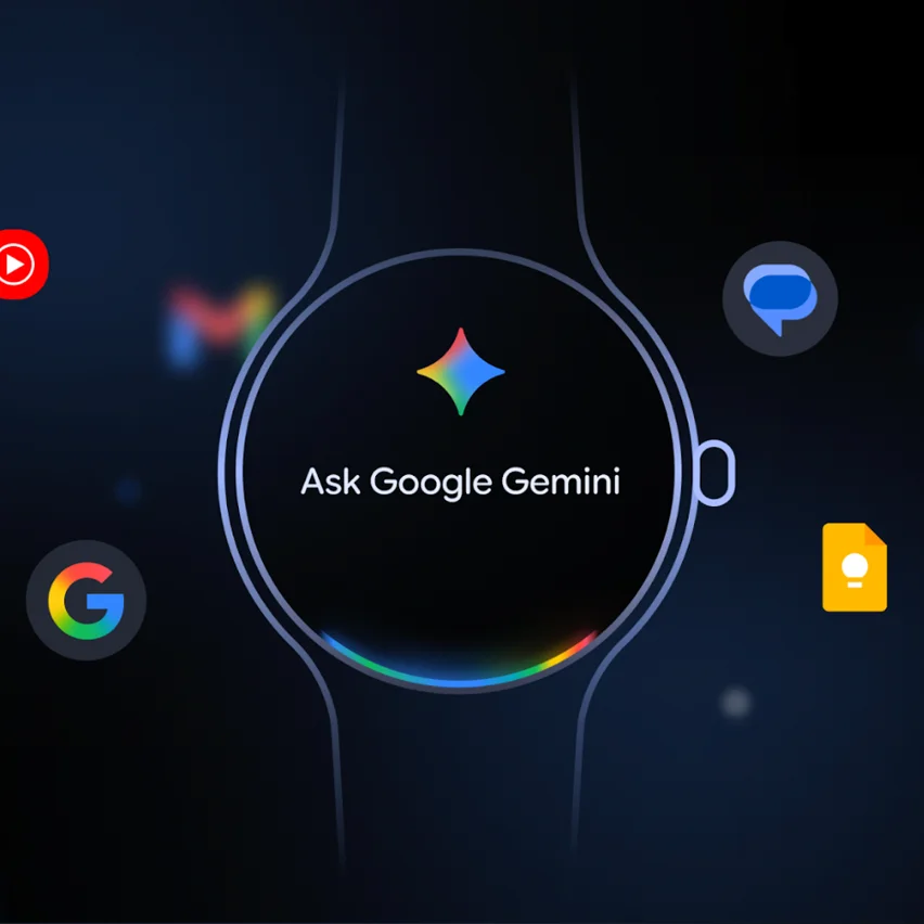A close-up of a smartwatch screen displaying Ask Google Gemini surrounded by blurred Google app icons.