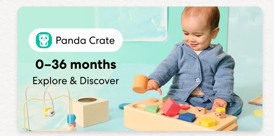 Baby playing with a KiwiCo Panda Crate toy. Designed for ages 0–36 months to explore and discover.