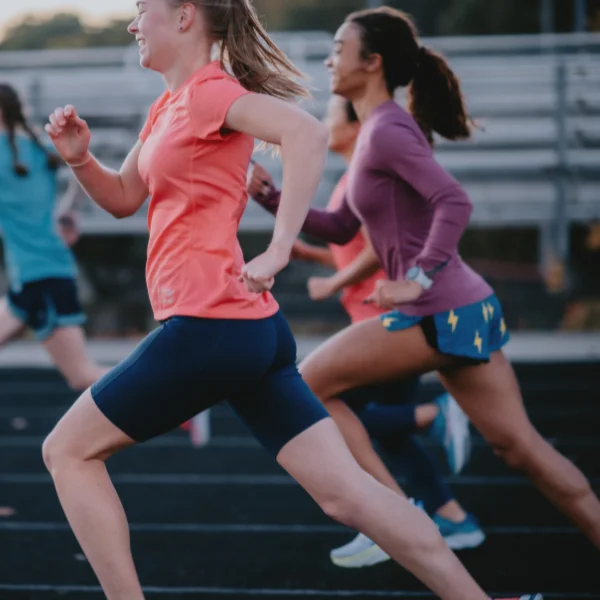 Girls running on a track