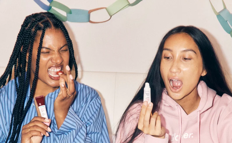 Tara and Glorietta applying Balm Dotcom.