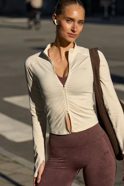 Image of Sculpt Seamless 2-Way Zip LS Ivory