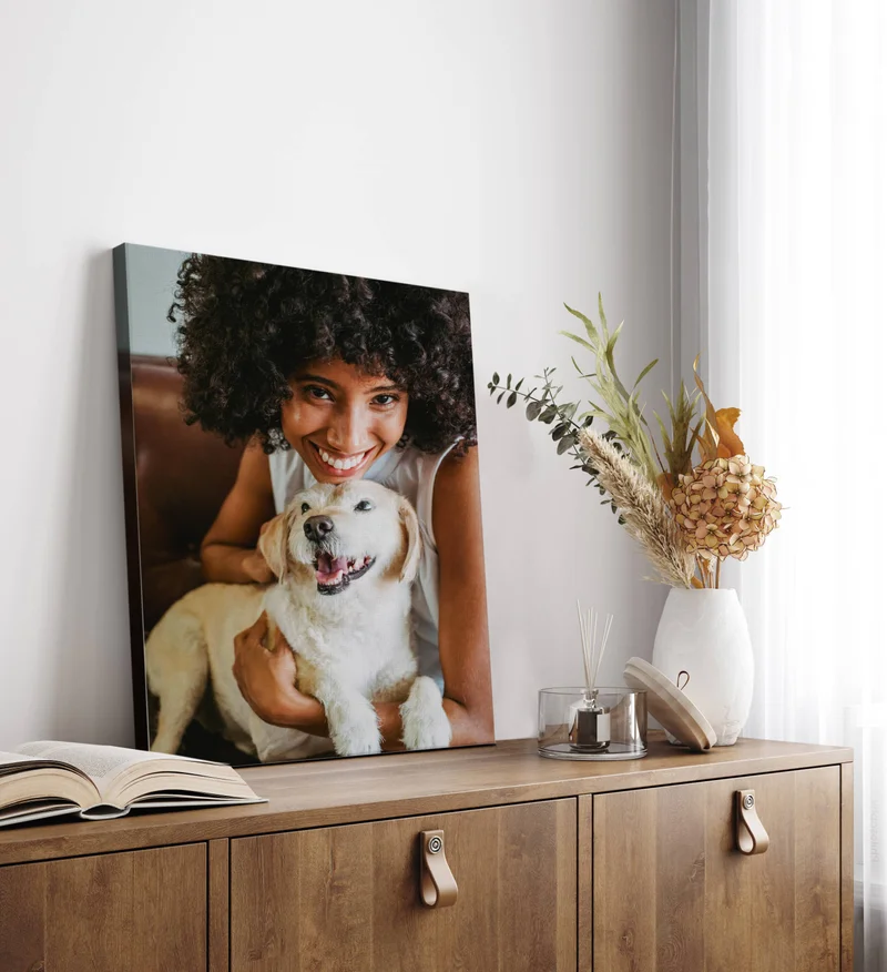 Canvas print of a woman and her dog.