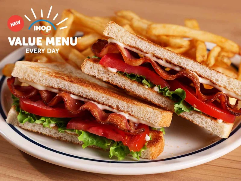The Value Menu BLT on a plate with fries.