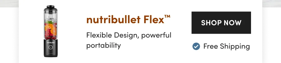 A portable nutribullet blender with fruits and ice inside.