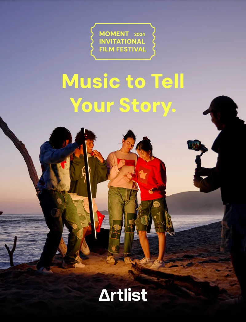 The Moment Invitational Film Festival - Music to Tell Your Story. Image of a group of people dancing in front of a camera at sunset