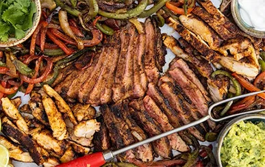 image of Griddled Steak and Chicken Fajitas
