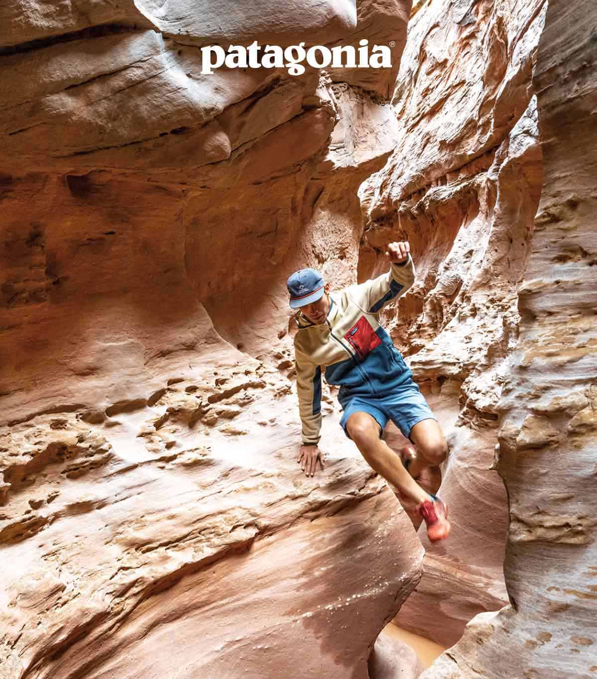Patagonia. A person hopping over water in a slot canyon.