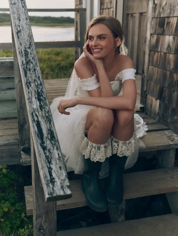 Woman in wedding reception outfit