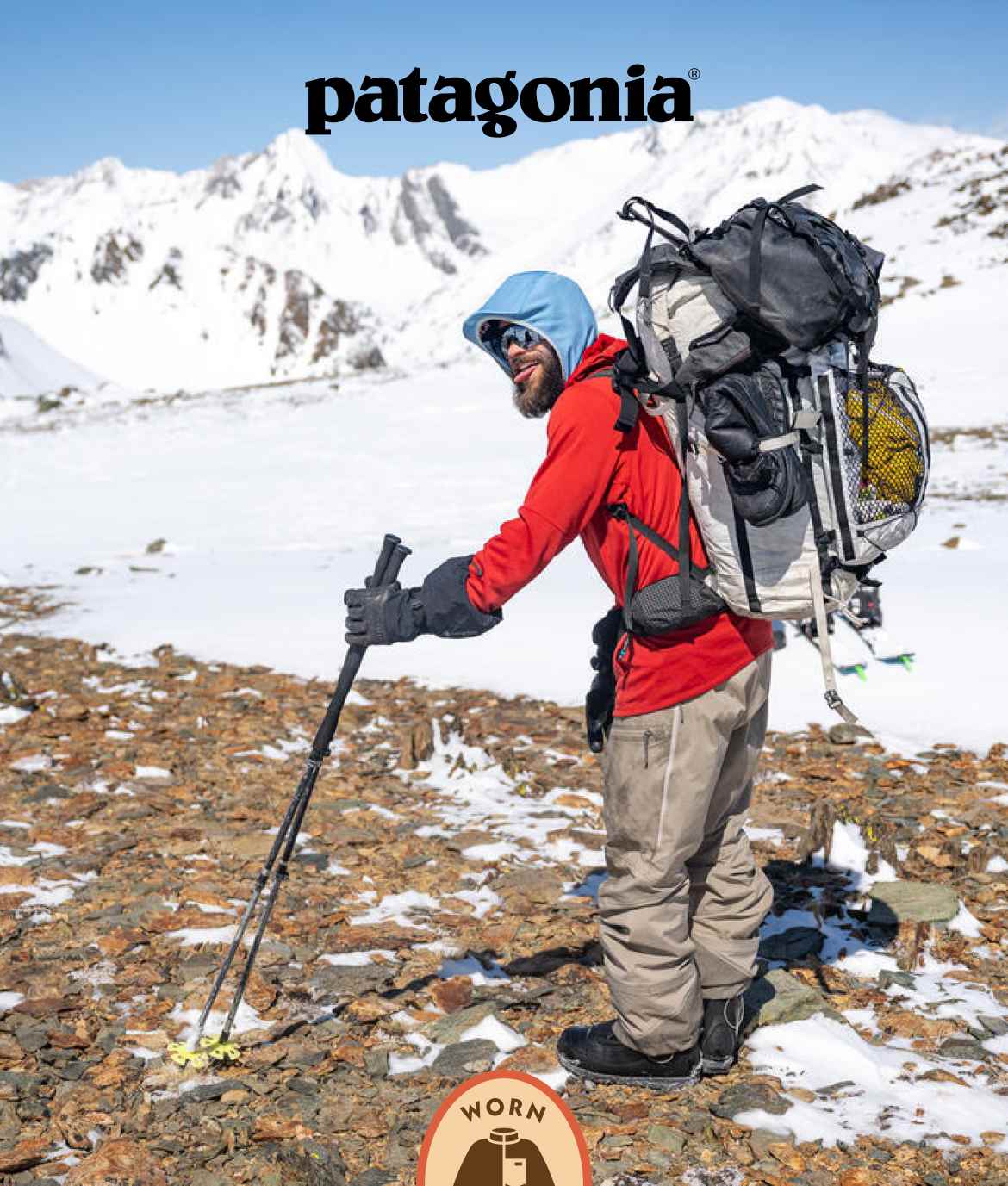 Patagonia. A snowboarder hikes into the backcountry with a big backpack.
