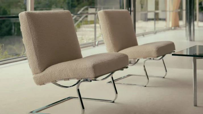 Two Tugendhat Lounge Chairs in cream upholstery and chrome base at Villa Tugendhat.